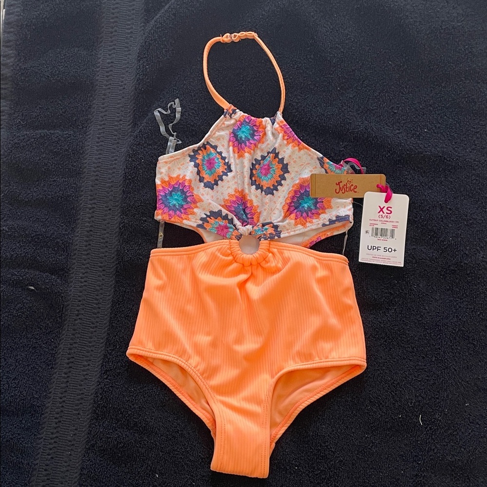 Justice Kids' Vibrant Orange and Multicolor one piece nwt upf 50